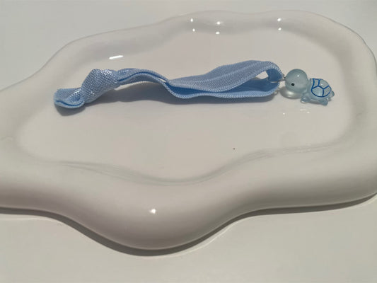 Elastisches Armband mit Schildkrötenanhänger – Hellblau